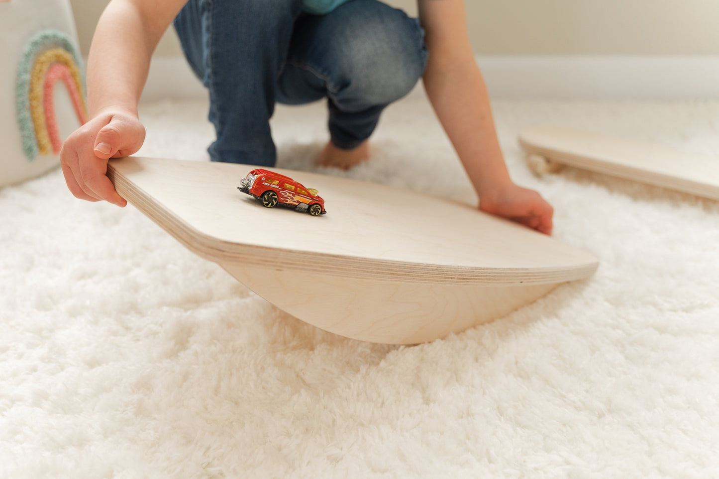 Blueberry and Third modern children's furniture balance board in natural birch, a standout piece of high-end kids playroom furniture and decor