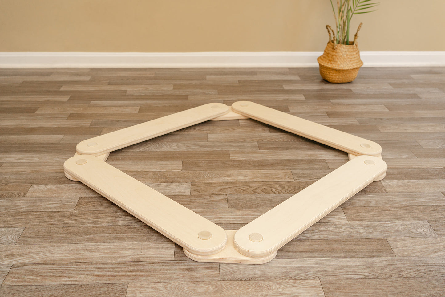 Blueberry and Third toddler balance beam as part of a children's obstacle course, modular beams connect and reconfigure for endless play possibilities