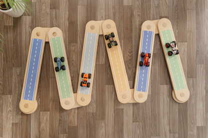 Balance beams with road sticker decals and trucks for kids to play with