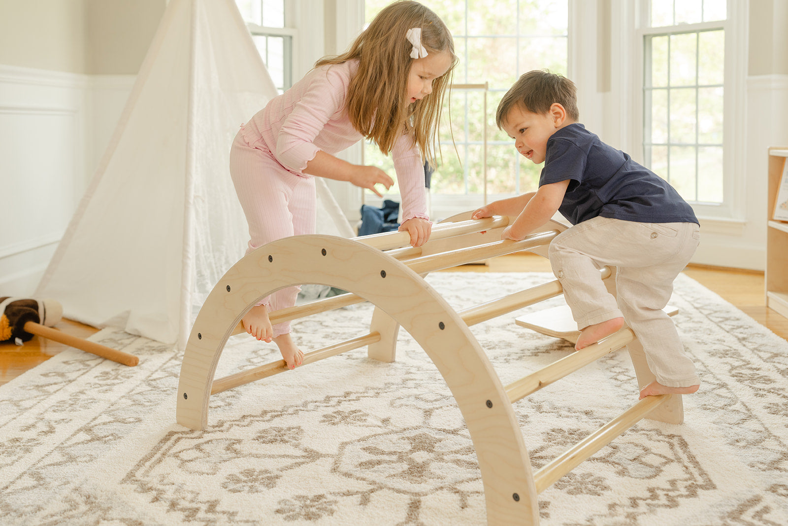 Blueberry and Third Climbing Arch as best gift for a 1 year old girl's birthday, Montessori climbing toy that builds balance, coordination, and confidence