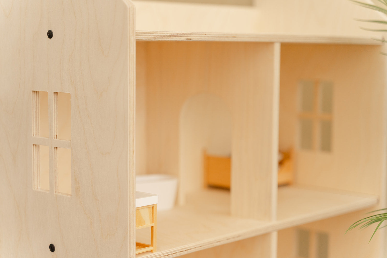 Wooden dollhouse interior showing four customizable rooms with arched doorways connecting spaces, 3-story life-size doll house with blank canvas walls ready for personalized wallpaper and 1:12 scale miniature furniture, pretend play house encouraging creative interior design and storytelling for children ages 3-10 years, Georgian meets Scandinavian aesthetic providing timeless backdrop for imaginative play and doll accessories