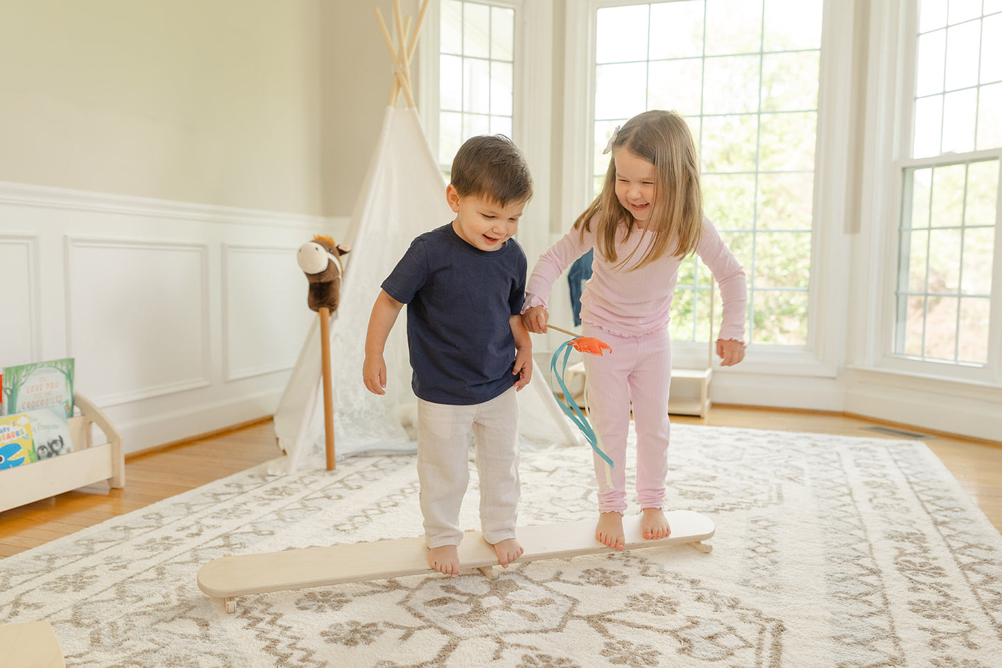 Blueberry and Third Wobble Beam providing vestibular and proprioceptive sensory input for toddlers, non-toxic solid wood children's balance toy, handcrafted in Ohio