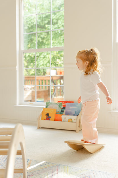 Blueberry and Third modern children's furniture balance board in natural birch, a standout piece of high-end kids playroom furniture and decor