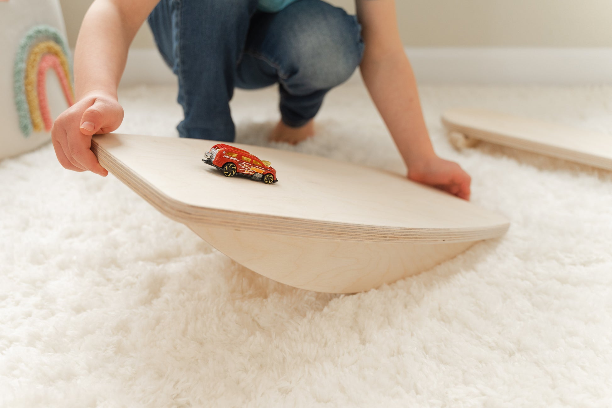 Blueberry and Third modern children's furniture balance board in natural birch, a standout piece of high-end kids playroom furniture and decor