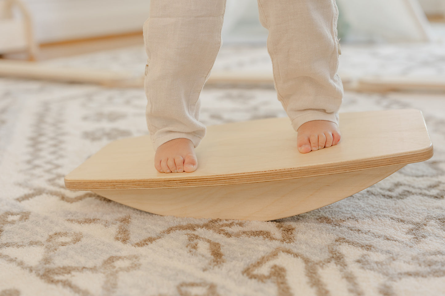 Blueberry and Third balance board in a calming corner setup, Montessori-inspired toddler furniture that supports focus and self-regulation