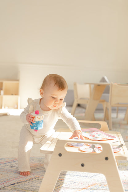 Blueberry and Third toddler play table styled in playroom, low wooden activity table at floor sitting height for fine motor development, handcrafted in Ohio