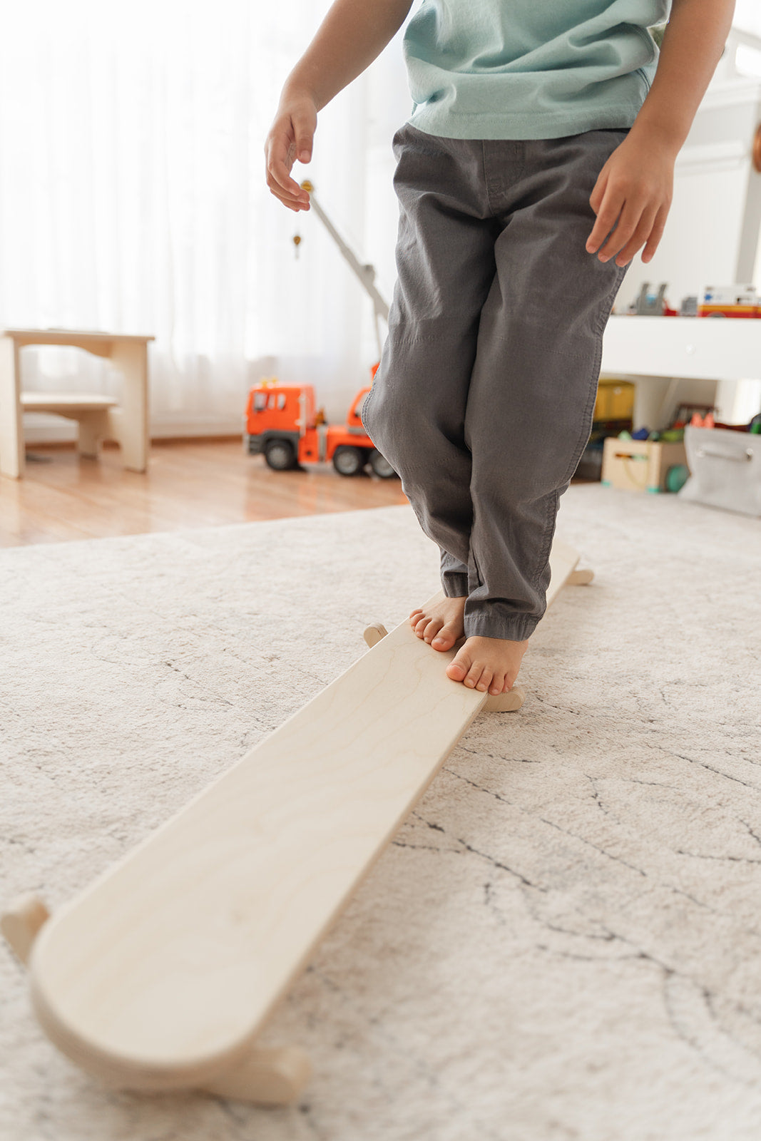 Blueberry and Third Wobble Beam in natural Baltic birch, tilting kids balance beam for toddlers recommended by pediatric OT and PT specialists, made in the USA