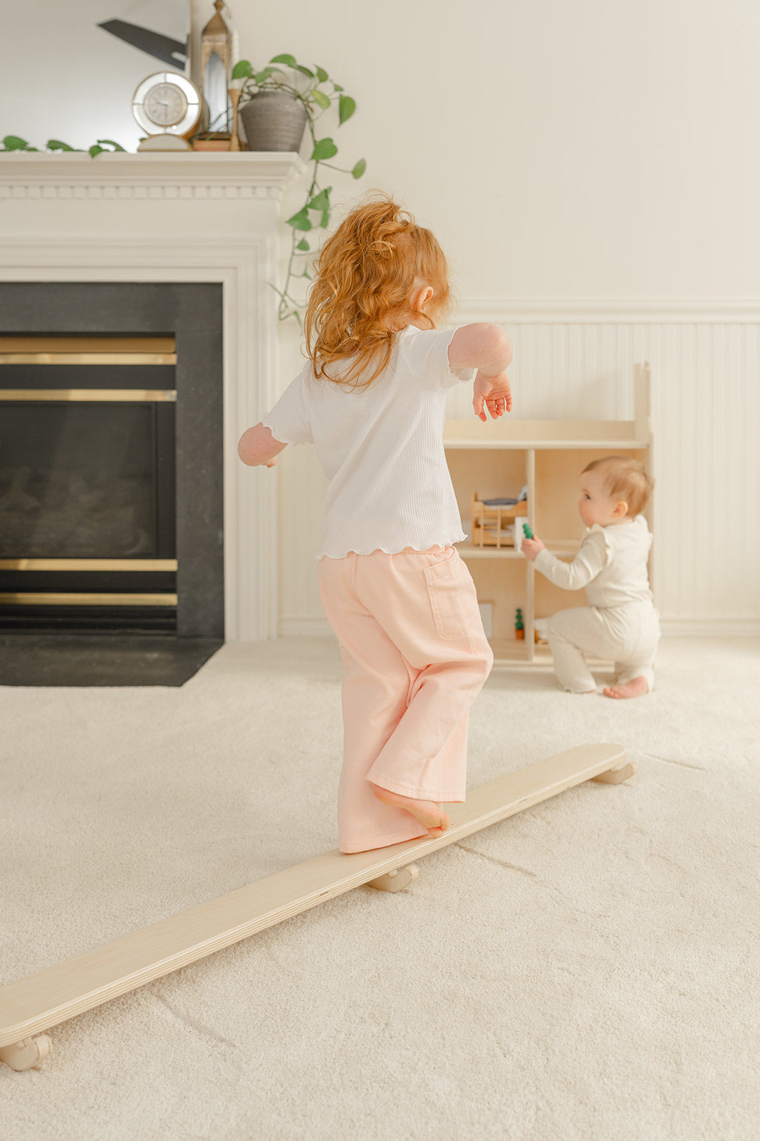 Blueberry and Third Wobble Beam in kids playroom furniture setup, Montessori-approved balance toy that supports focus, attention, and self-regulation in toddlers