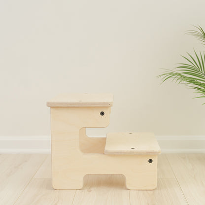 Wooden step stool for kids with two-step design for kitchen counter access, toddler step stool with natural birch finish helping children reach countertops for handwashing tooth brushing and cooking activities, Montessori kitchen helper stool handcrafted in USA with non-slip feet and sturdy construction supporting 200 pounds.