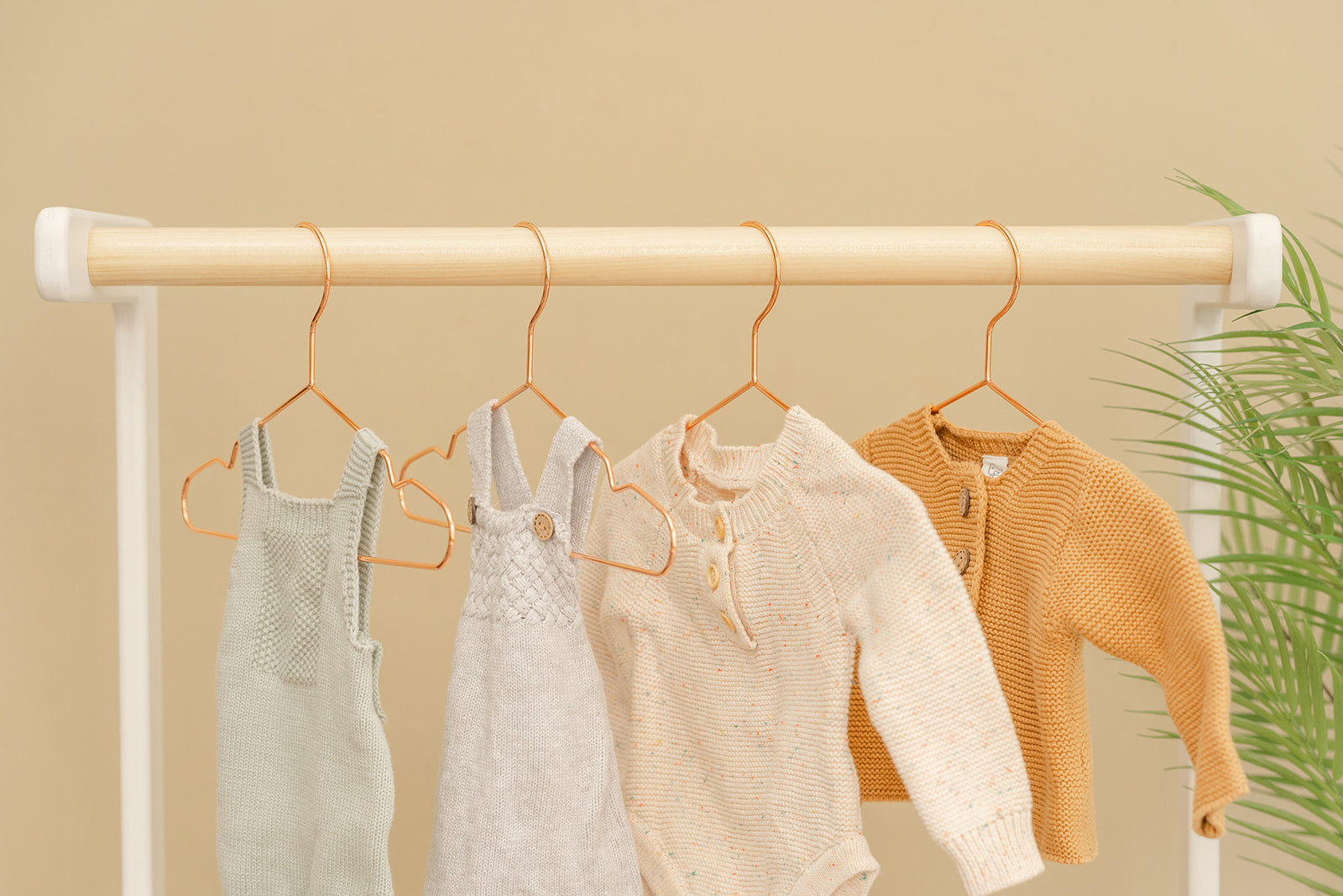Clothing rack with small hanging baby clothes