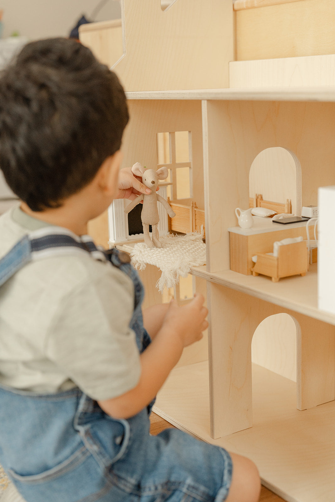Large wooden dollhouse furnished with 1:12 scale miniature accessories including tiny furniture dolls and home decor items, 3-story customizable doll house showcasing how children can personalize each of four rooms with miniatures, pretend play house encouraging organizational skills decision-making and creative expression through interior design for young kids developing fine motor skills and imaginative thinking abilities