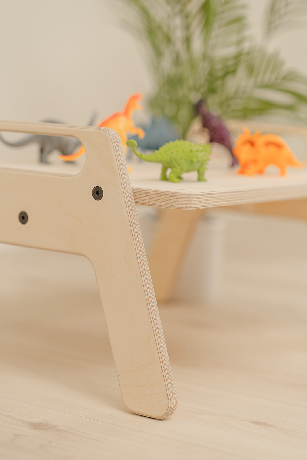 Small wooden toddler table with tray design perfect for floor activities sensory play and independent snack time, Montessori-inspired portable play tray for ages 9 months to 6 years promoting self-directed activities, USA-made children's furniture with child-friendly height and sturdy construction for playroom bedroom or classroom use